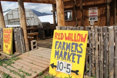 Red Willow Farmers Market sign. Photo by Angelo Baca