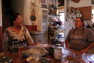 Margaret and Clayton in their kitchen with some of their traditional corn. Photo by Angelo Baca