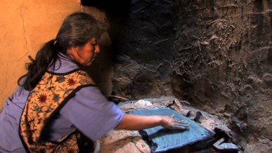Ruby Chimerica (Hopi) making piki bread. Photo courtesy of KCET