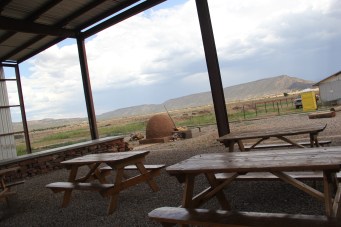 The farm site also has a large open-air building that is dedicated to both educational instruction and community events. Here they host classes, cooking demonstrations, movie screenings and birthday parties. The structure was designed by a social entrepreneurship/affordabe design class from Stanford. Photo by Angelo Baca