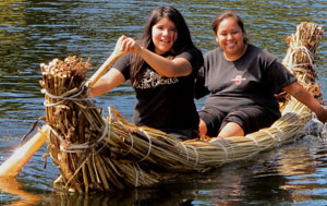 Participants from the Federated Indians of Graton Rancheria have  a blast riding on the Tule boat built at the community workshop. Photo courtesy of TCC