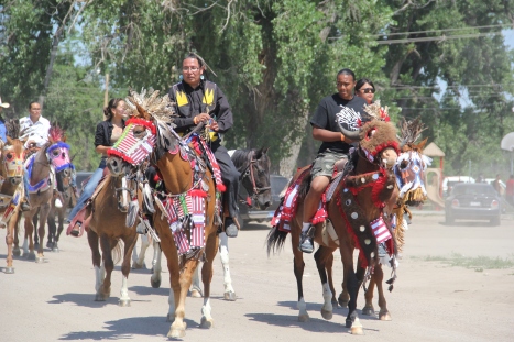 Parade for the Oglala Wacipi, July 2014. Horses are still an important part of life and culture on Pine Ridge. Photo by Angelo Baca