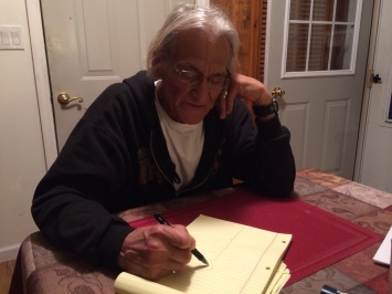 Tom Cook, drawing a map of uranium mining in southwestern South Dakota. Photo by Elizabeth Hoover