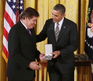 Billy Mills receiving the Presidential Citizen Medal in 2012 for his work with Running Strong.