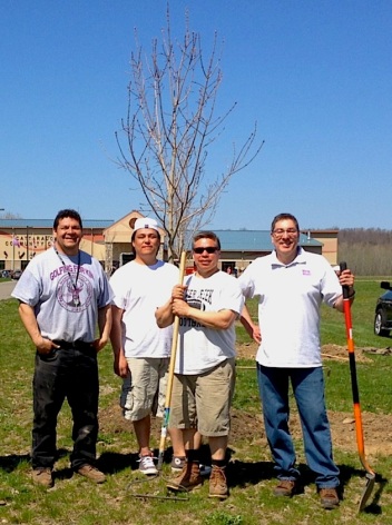 Planting sugar maples at the community center. Photo courtesy of Ken Parker