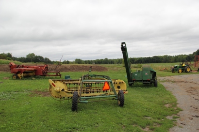 Some of the vintage farm equipment that Tsyunhehkw^ staff have revitalized to work the corn fields. Photo by Angelo Baca