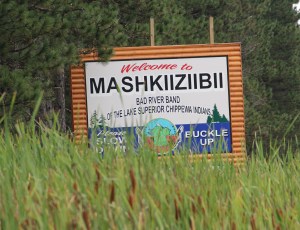 Sign at entrance to the Bad River Reservation. Photo by Angelo Baca