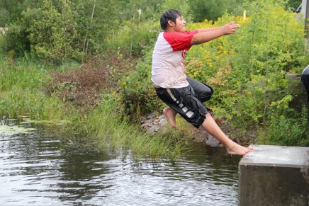 Swimming in the Kakagon (despite cold, cloudy weather and leaches). Photo by Angelo Baca