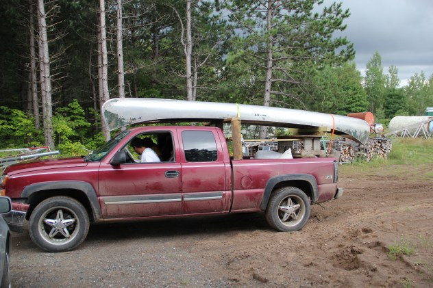 After a long day on the lake, ricers pull into Bruce's, where they sell him the raw rice by the pound. Photo by Elizabeth Hoover 8/30/14