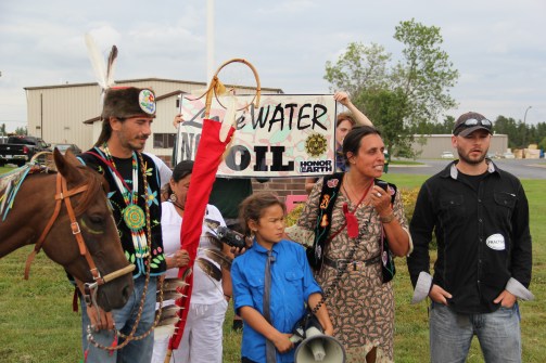 Michael Dahl, Winona LaDuke and Shane Davis at the Honor the Earth press conference outside of Enbridge's Bemidji office. Photo by Elizabeth Hoover