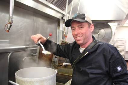 The other conference organizer, Dan Cornelius, Technical Assistance Specialist for the Intertribal Agriculture Council. On Tuesday night Dan donned a chef coat and made a wild rice and squash cake. Photo by Elizabeth Hoover