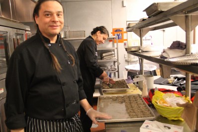Sean and Christine making the rice cakes. Photo by Elizabeth Hoover