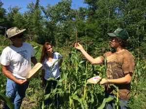Zach Paige teaching a seed saving workshop on the WELRP farm. Photo by Elizabeth Hoover