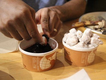 Frybread bites for dessert, dipped in blueberry sauce (photo by Elizabeth Hoover)