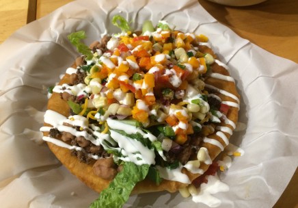 Frybread that Ben assembled for us with buffalo meat, beans, lettuce, butternut squash, cheese, sour cream, hominy, peppers and onions. (Photo by Elizabeth Hoover) 
